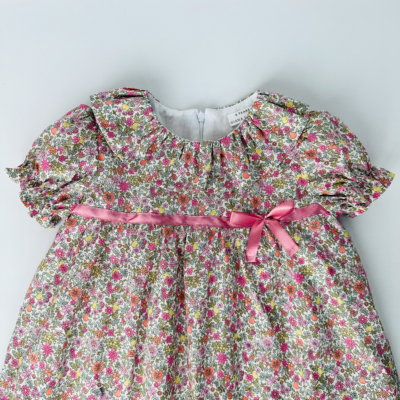 pink baby girl dress with round collar made with liberty fabric