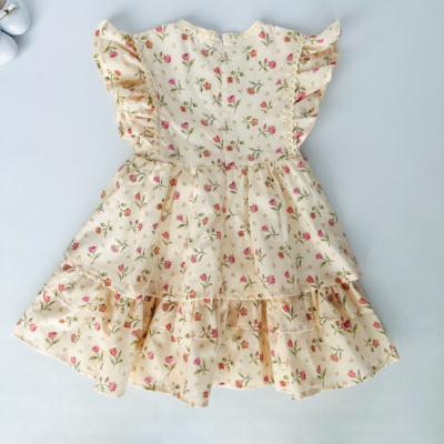 tiered kid dress with ruffles cream