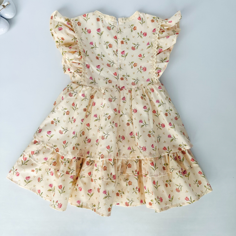 tiered kid dress with ruffles cream