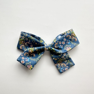 girl hair bow made with liberty fabric blue flowers and roses