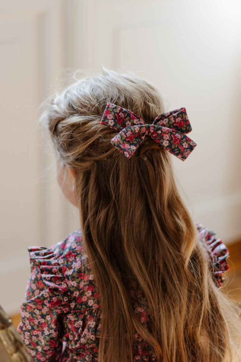 girl hair bow in small burgundy flowers liberty tana lawn cotton