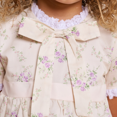 bow underneath the neckline bridgerton inspired girl dress