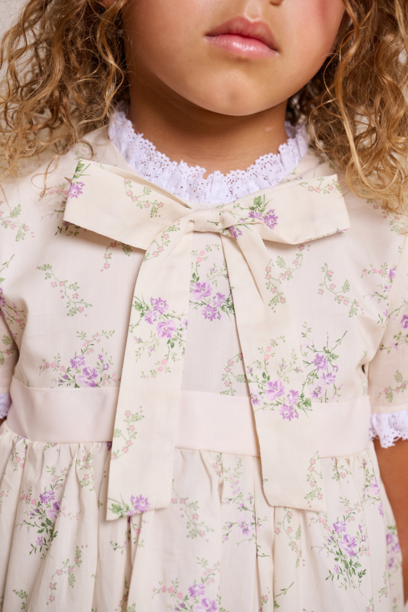 bow underneath the neckline bridgerton inspired girl dress