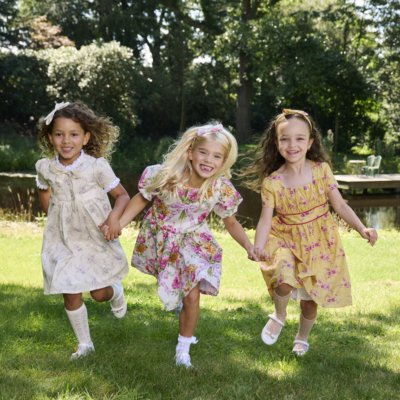 girls running in traditional dresses bridgerton inspired