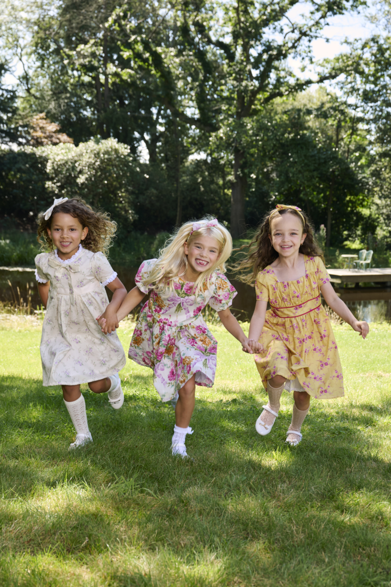 girls running in traditional dresses bridgerton inspired