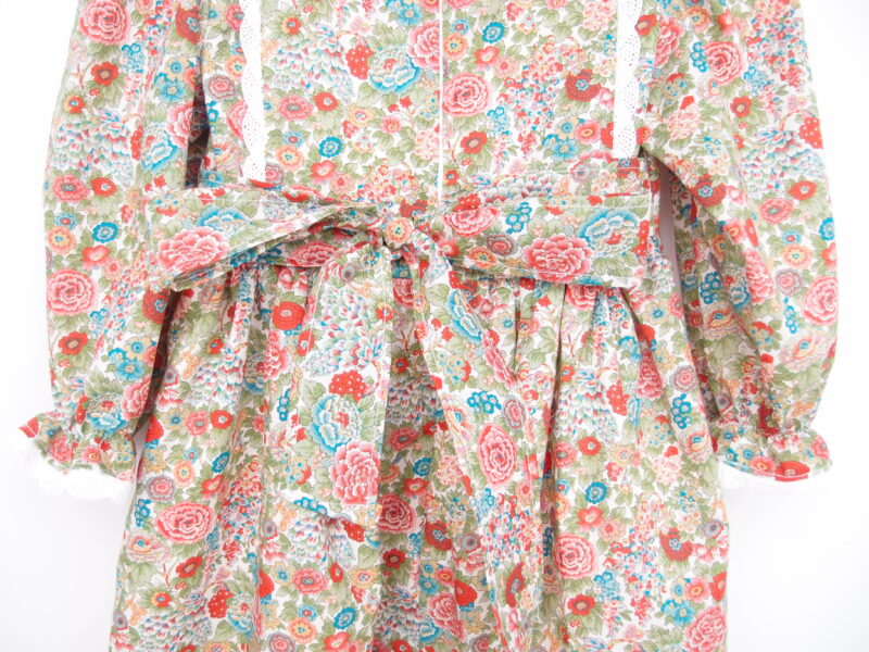 back of toddler girl dress with long sleeves and sash tieable bow liberty fabric