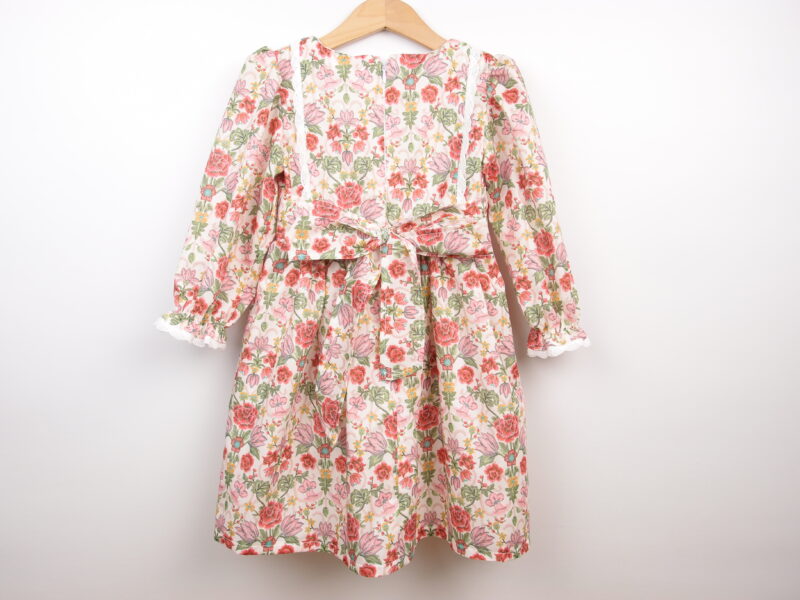 floral toddler dress with long sleeves and bow at the back handmade from Liberty fabric