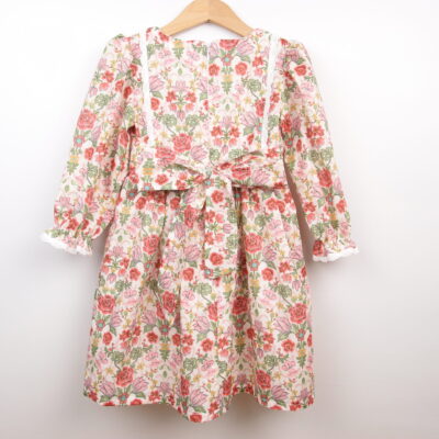 floral toddler dress with long sleeves and bow at the back handmade from Liberty fabric